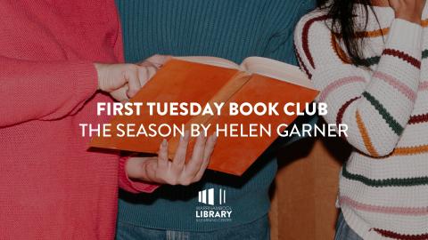 Close up of hands holding an open book 